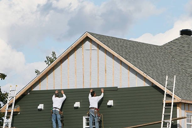 Professional Siding technician working in Pine Level, NC